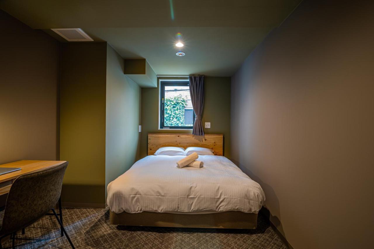 Quarto Duplo Standard com Banheiro Compartilhado