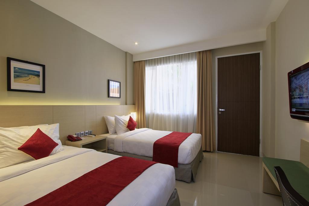 Deluxe Tweepersoonskamer met 1 Tweepersoonsbed of 2 Aparte Bedden en een Extra Bed