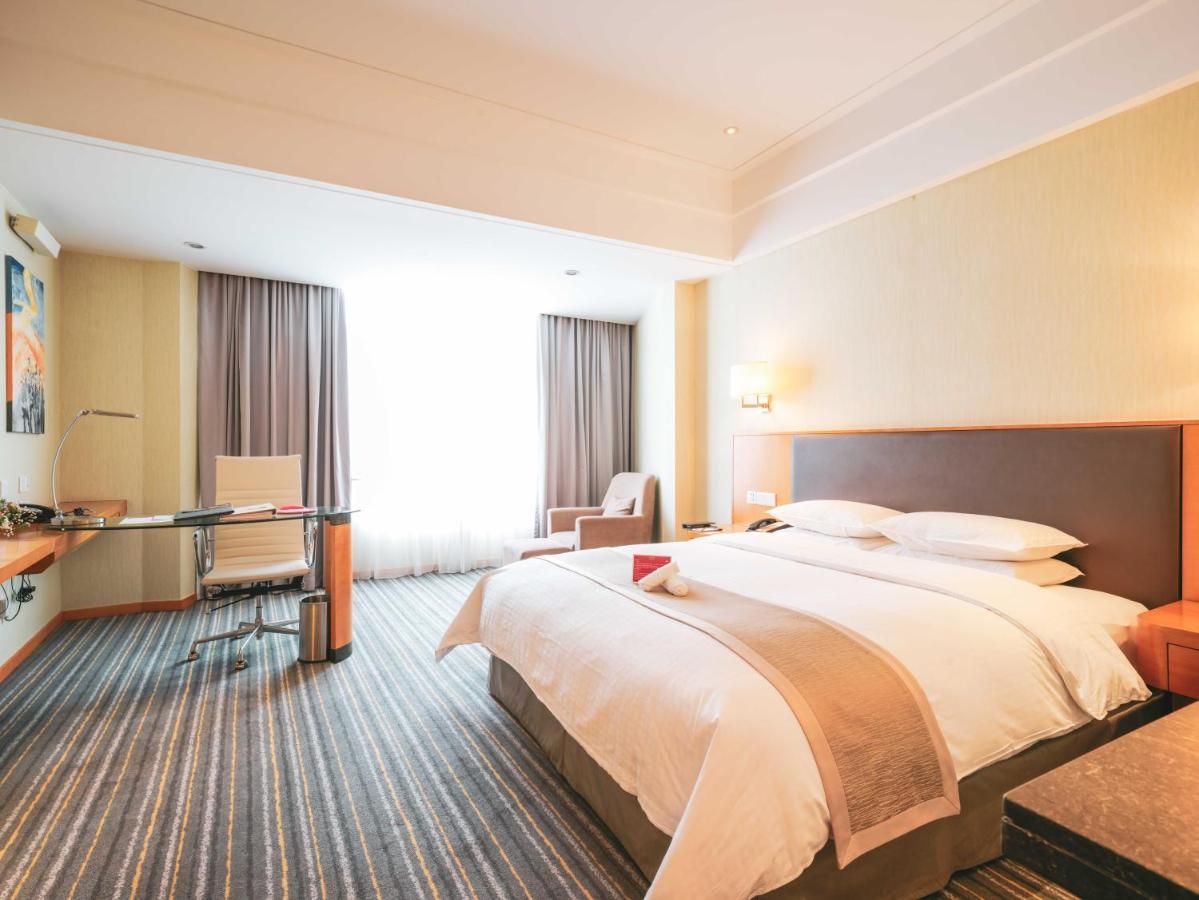 Chambre Lit King-Size Deluxe - Non-Fumeurs