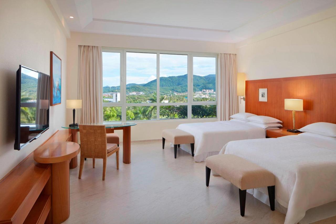 Classic Zimmer mit 2 Doppelbetten und Blick auf den Golf (beheizter Pool)