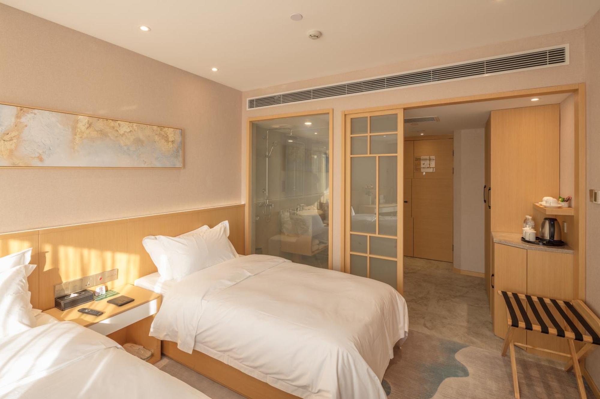 Quarto Deluxe com Cama de Casal ou 2 de Solteiro