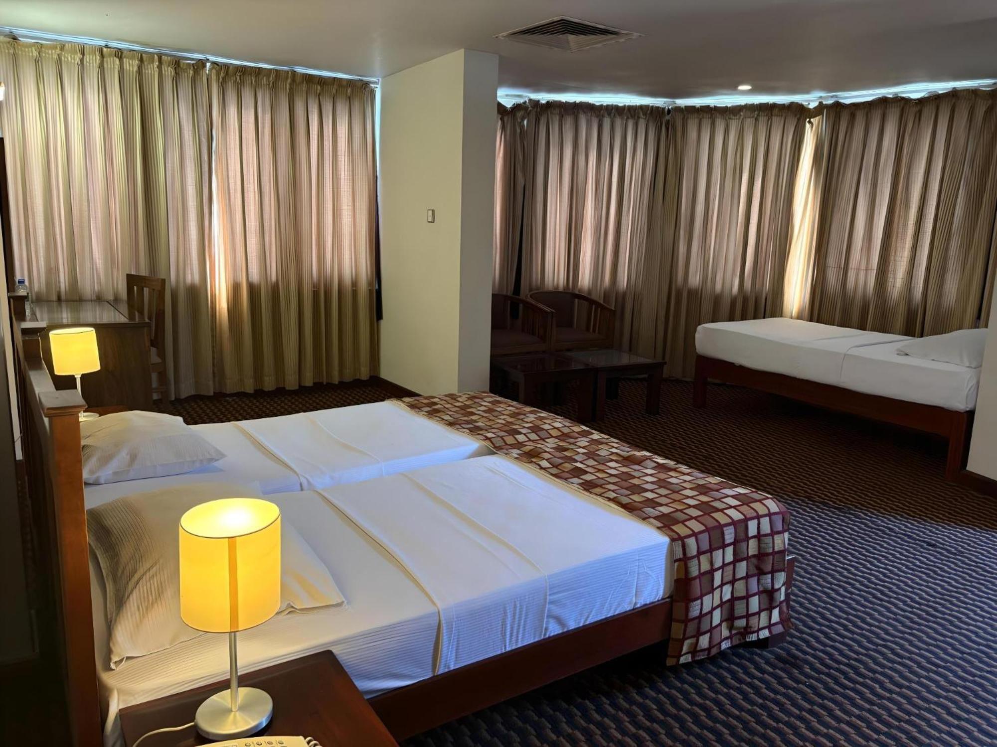 Deluxe Triple Room