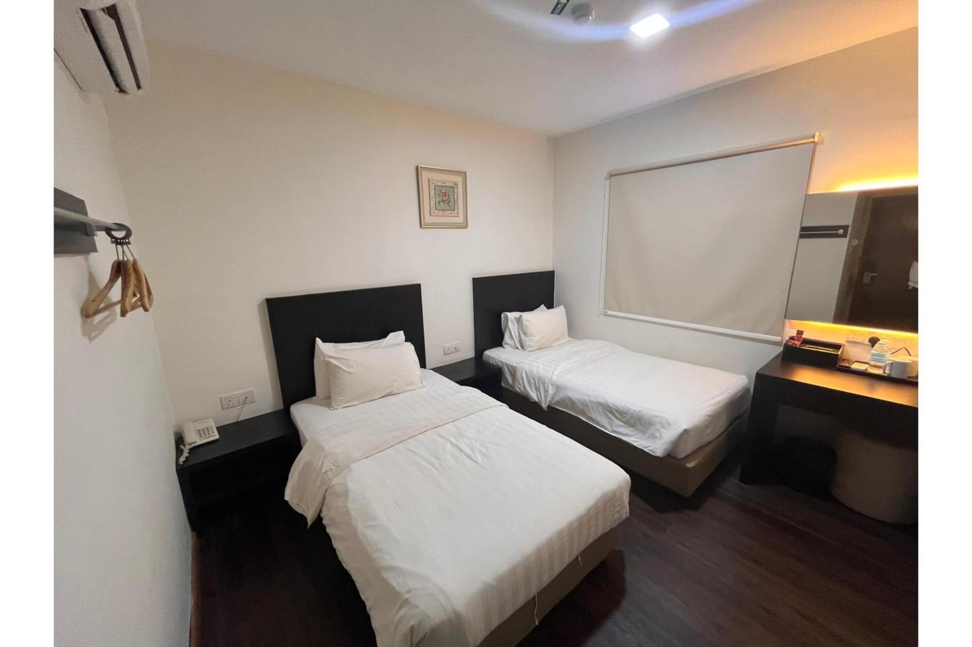 Quarto Deluxe com 2 Camas de Solteiro