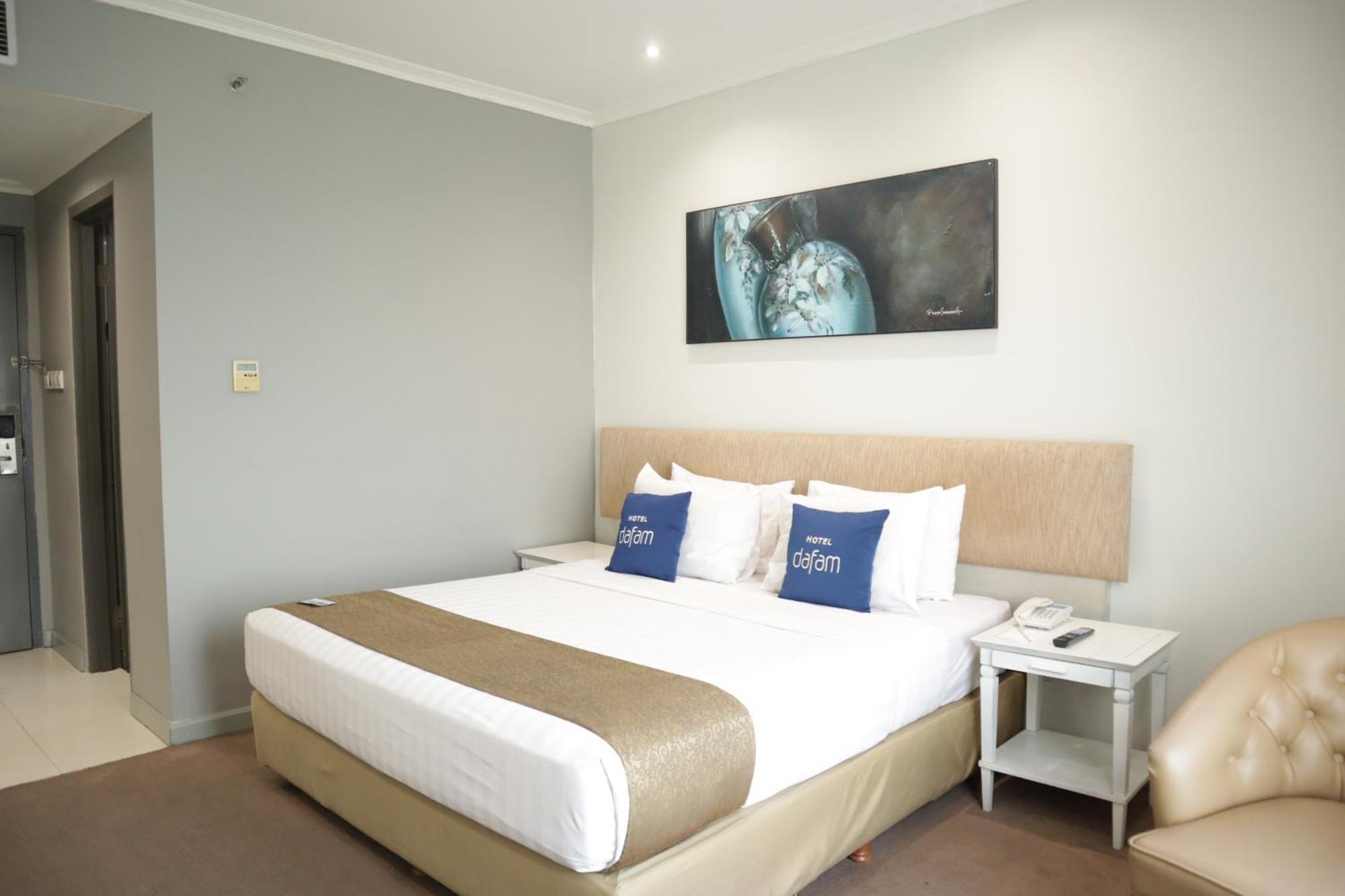 Chambre Lit King-Size Deluxe - Fumeurs
