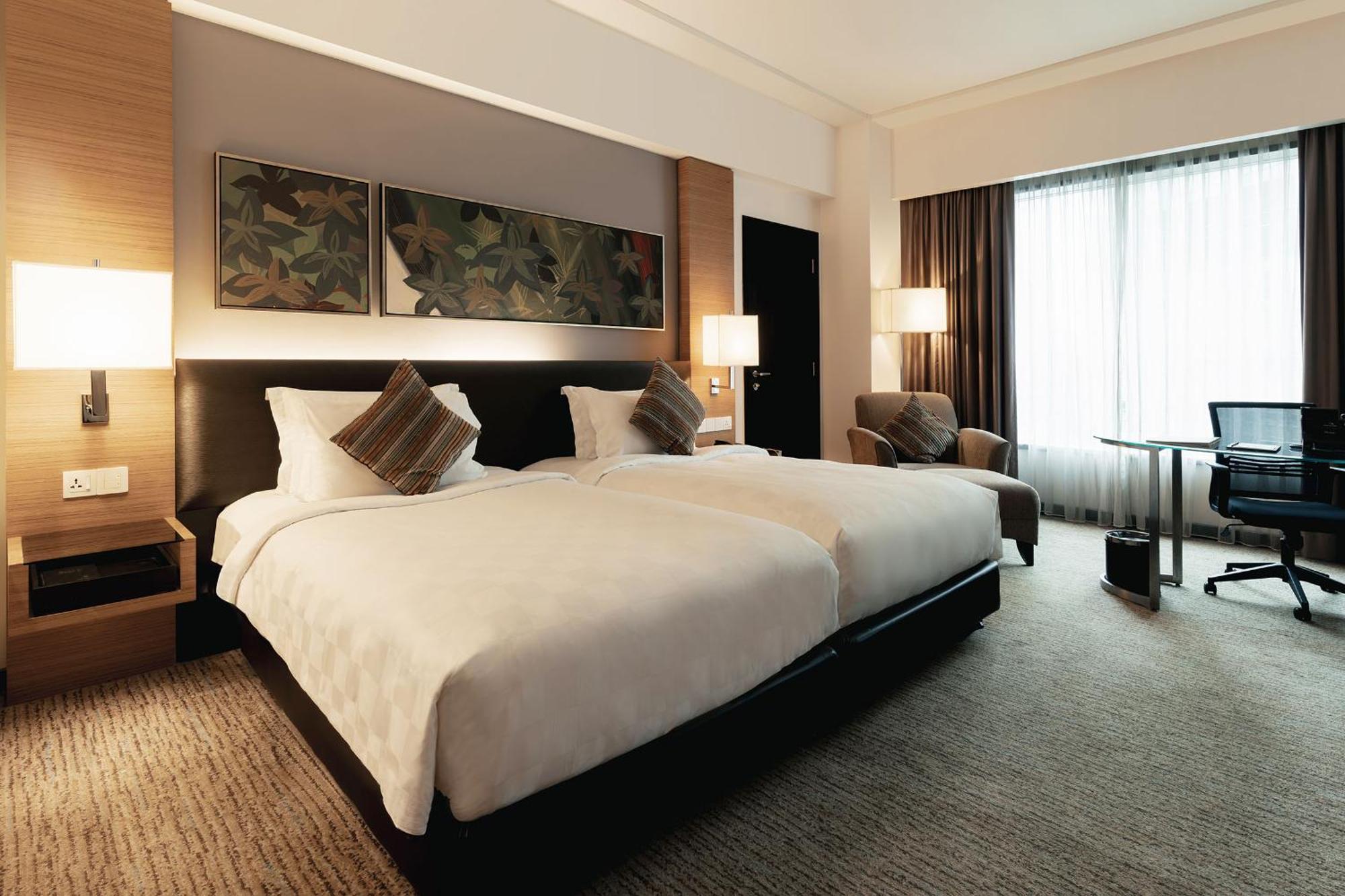 Club Deluxe Tweepersoonskamer met 2 Aparte Bedden - Kamer met Ontbijt