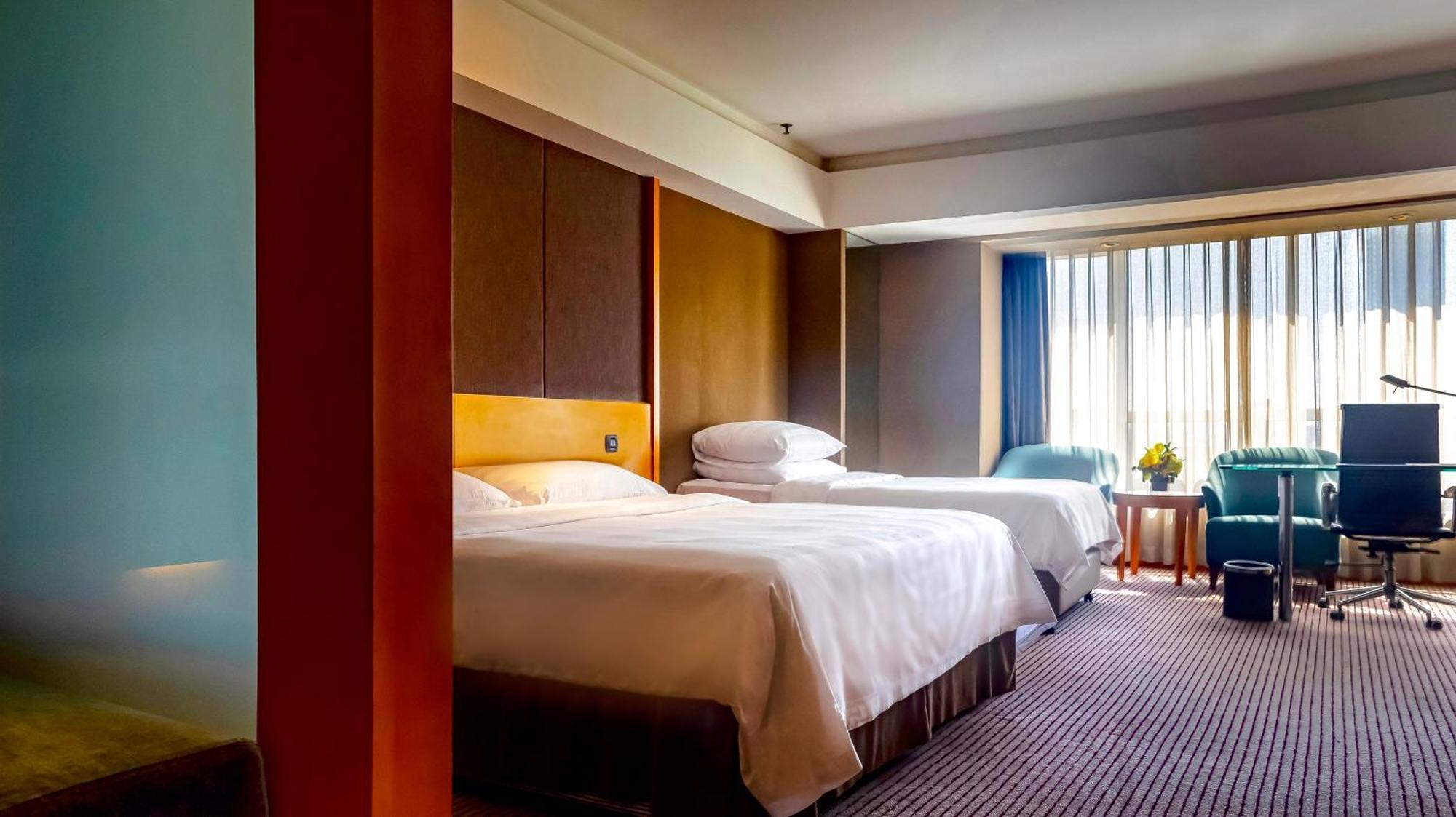 Deluxe Room with One King Bed and One Single Bed