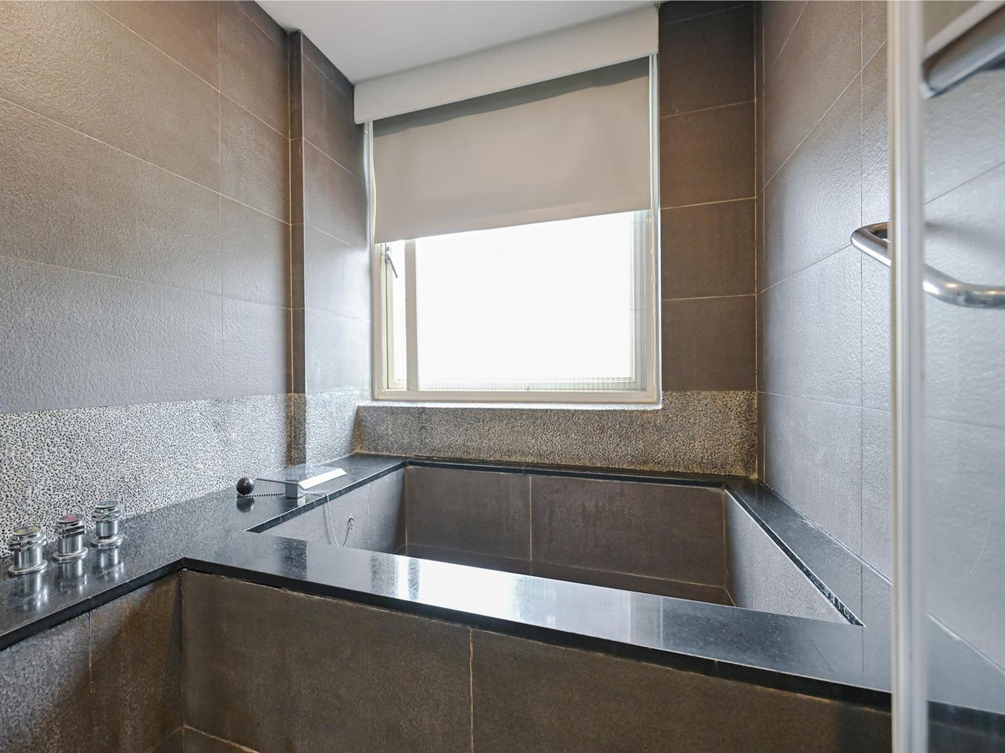 Chambre Lits Jumeaux Deluxe avec Baignoire