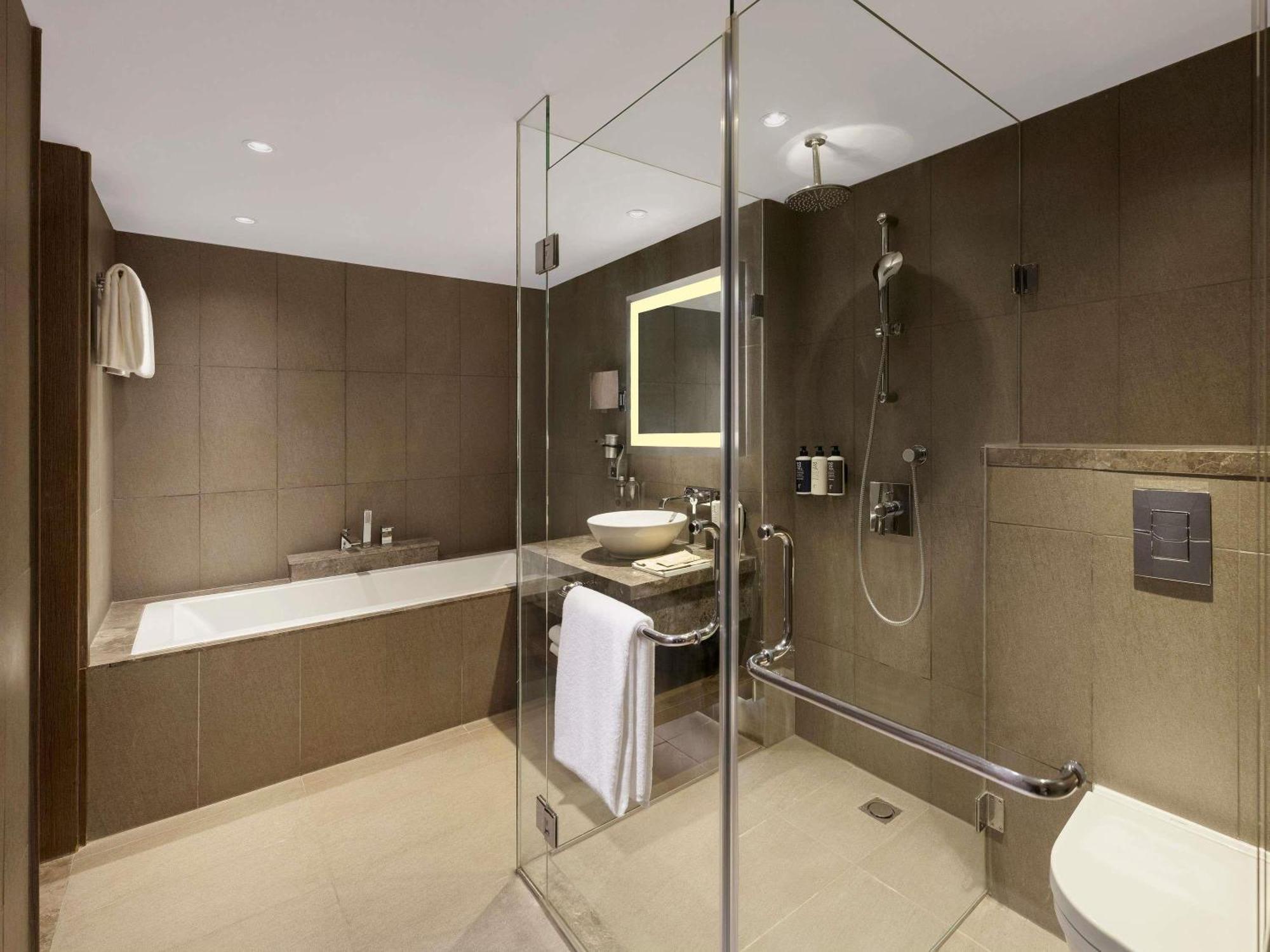 Junior Suite 2 Way Airport Transfers Lounge Access on F&B Laundry