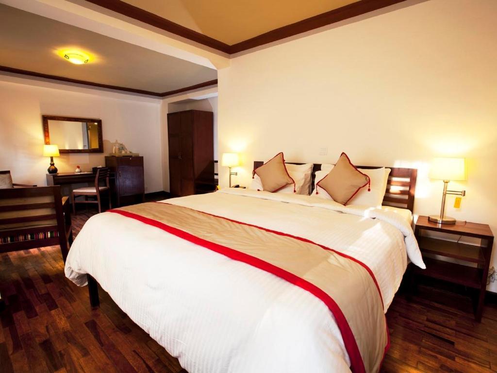 Deluxe Zimmer mit Kingsize-Bett