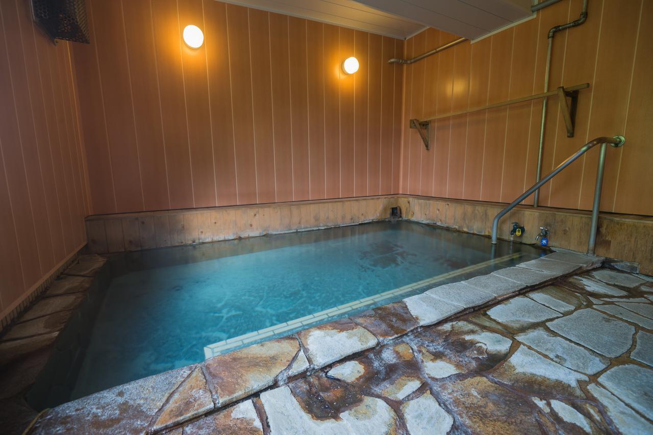 Japanese-Style Family Room with Shared Toilet