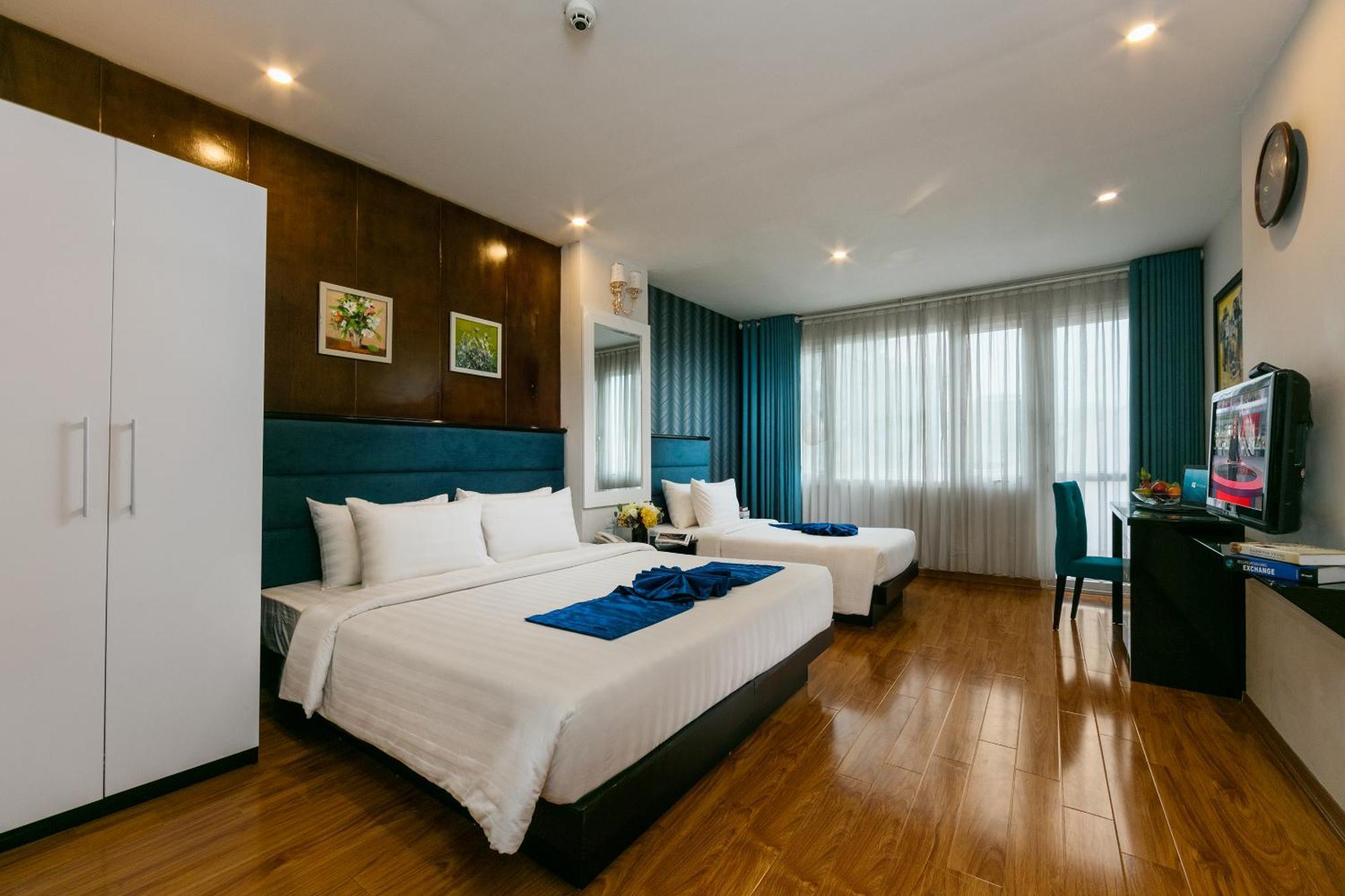 Dreibettzimmer mit Balkon