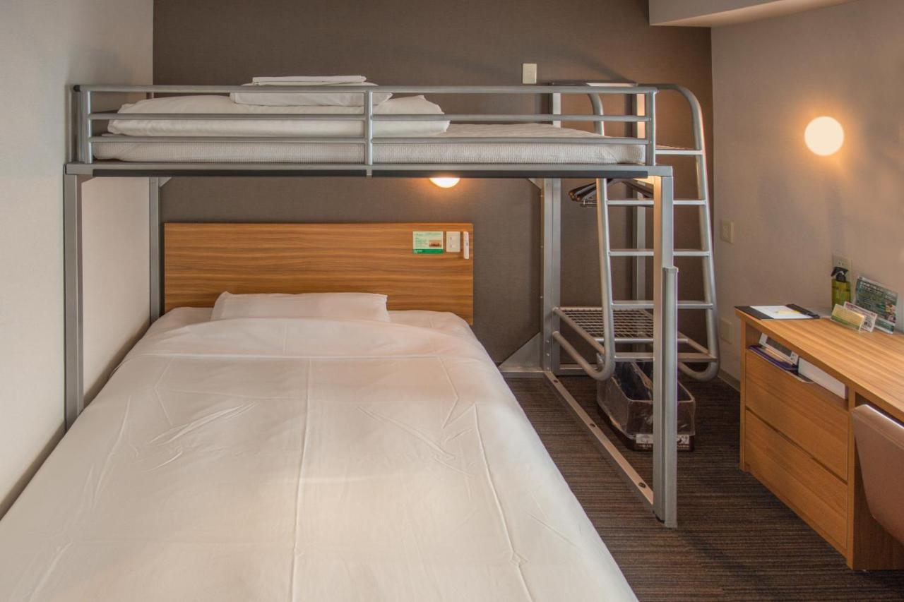 Habitación Doble - Cama elevada